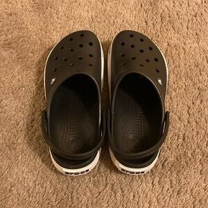 New Black Crocs Women’s size 11, Men’s size 9